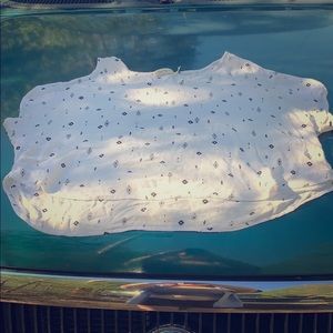 This is a t-shirt, shoulders exposed,